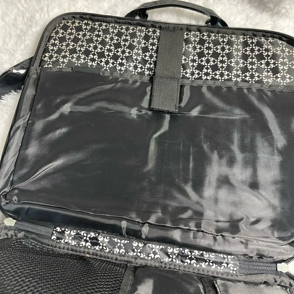 Black and white padded laptop bag with detachable padded shoulder strap